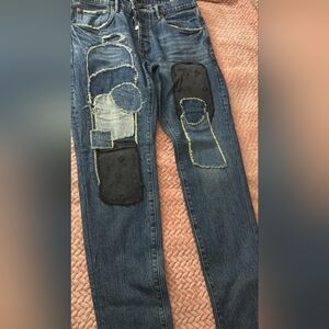 Men's Distressed Blue Jeans with Black Patches